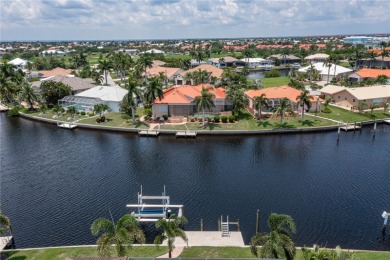 WATERFRONT HOME IN PGI W/SAIL ACCESS & 91FT OF SEAWALL! Check on Saint Andrews South Golf Club in Florida - for sale on GolfHomes.com, golf home, golf lot