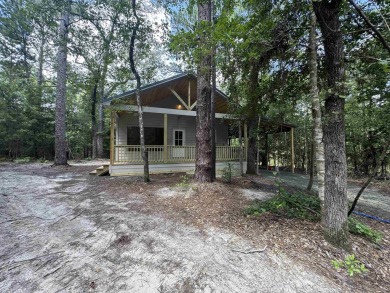 NEW CONSTRUCTION!! Darling cabin in the woods! Located in a on Rayburn Country Club in Texas - for sale on GolfHomes.com, golf home, golf lot