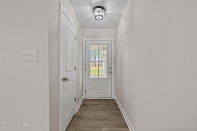 Move right into this beautifully renovated 3 bedroom, 2 bathroom on River Bend Golf and Country Club in North Carolina - for sale on GolfHomes.com, golf home, golf lot