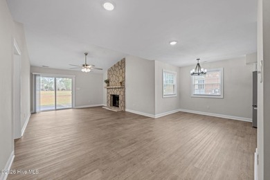 Move right into this beautifully renovated 3 bedroom, 2 bathroom on River Bend Golf and Country Club in North Carolina - for sale on GolfHomes.com, golf home, golf lot