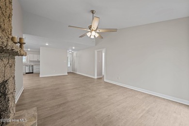 Move right into this beautifully renovated 3 bedroom, 2 bathroom on River Bend Golf and Country Club in North Carolina - for sale on GolfHomes.com, golf home, golf lot