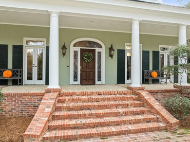 A wood-beamed pavilion, a fire pit glowing under string lights on Canebrake Country Club in Mississippi - for sale on GolfHomes.com, golf home, golf lot