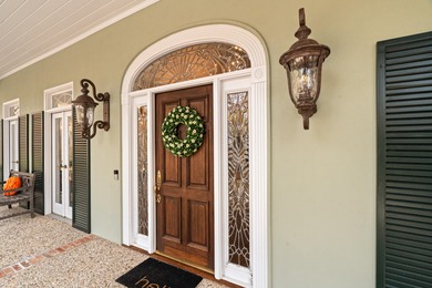 A wood-beamed pavilion, a fire pit glowing under string lights on Canebrake Country Club in Mississippi - for sale on GolfHomes.com, golf home, golf lot