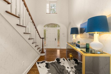 A wood-beamed pavilion, a fire pit glowing under string lights on Canebrake Country Club in Mississippi - for sale on GolfHomes.com, golf home, golf lot