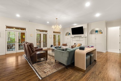 A wood-beamed pavilion, a fire pit glowing under string lights on Canebrake Country Club in Mississippi - for sale on GolfHomes.com, golf home, golf lot