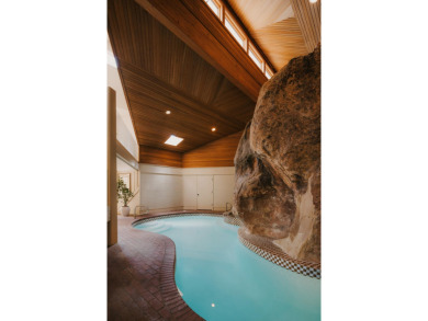 Carved into the side of the Bloomington Bluff, this 7,258 sq ft on Bloomington Country Club in Utah - for sale on GolfHomes.com, golf home, golf lot