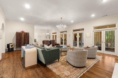 A wood-beamed pavilion, a fire pit glowing under string lights on Canebrake Country Club in Mississippi - for sale on GolfHomes.com, golf home, golf lot