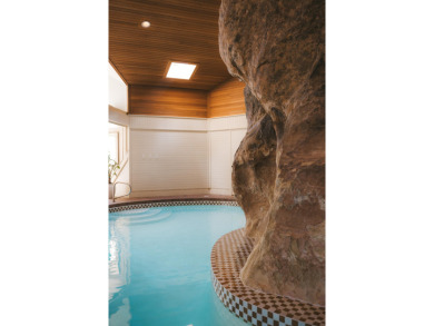 Carved into the side of the Bloomington Bluff, this 7,258 sq ft on Bloomington Country Club in Utah - for sale on GolfHomes.com, golf home, golf lot