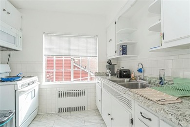 A RARE opportunity to own a well-maintained, all brick 6 family on Silver Lake Golf Course in New York - for sale on GolfHomes.com, golf home, golf lot