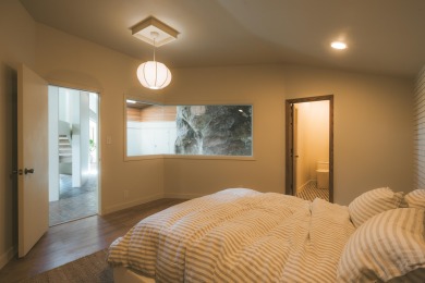 Carved into the side of the Bloomington Bluff, this 7,258 sq ft on Bloomington Country Club in Utah - for sale on GolfHomes.com, golf home, golf lot