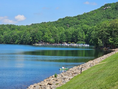 Nestled within the serene and exclusive Big Canoe community in on Big Canoe Golf Club - Cherokee in Georgia - for sale on GolfHomes.com, golf home, golf lot