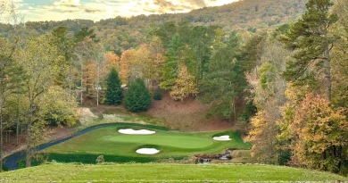 Nestled within the serene and exclusive Big Canoe community in on Big Canoe Golf Club - Cherokee in Georgia - for sale on GolfHomes.com, golf home, golf lot