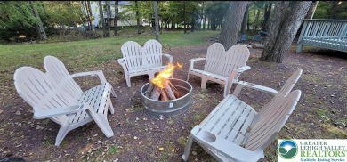 Don't let the outside fool you, this home feels more spacious on Pocono Farms Country Club in Pennsylvania - for sale on GolfHomes.com, golf home, golf lot