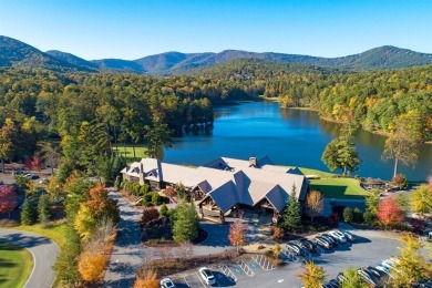 Nestled within the serene and exclusive Big Canoe community in on Big Canoe Golf Club - Cherokee in Georgia - for sale on GolfHomes.com, golf home, golf lot