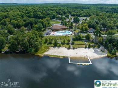 Don't let the outside fool you, this home feels more spacious on Pocono Farms Country Club in Pennsylvania - for sale on GolfHomes.com, golf home, golf lot