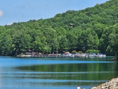 Nestled within the serene and exclusive Big Canoe community in on Big Canoe Golf Club - Cherokee in Georgia - for sale on GolfHomes.com, golf home, golf lot