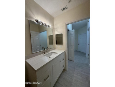 This COMPLETELY RENOVATE two-bedroom and two-bath condominium on Ventura Country Club in Florida - for sale on GolfHomes.com, golf home, golf lot