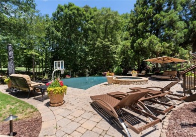This custom estate embodies luxury, privacy and timeless on The Palisades Country Club in North Carolina - for sale on GolfHomes.com, golf home, golf lot