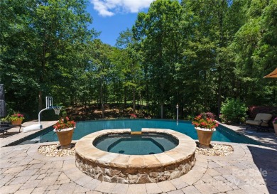 This custom estate embodies luxury, privacy and timeless on The Palisades Country Club in North Carolina - for sale on GolfHomes.com, golf home, golf lot
