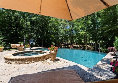 This custom estate embodies luxury, privacy and timeless on The Palisades Country Club in North Carolina - for sale on GolfHomes.com, golf home, golf lot
