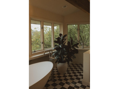 Offered fully furnished by designer Emily Barnas, this rare 7 on Bloomington Country Club in Utah - for sale on GolfHomes.com, golf home, golf lot