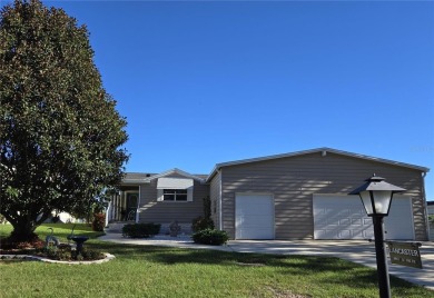 BEAUTIFULLY MAINTAINED TRIPLE WIDE GOLF COURSE HOME IN ZELLWOOD on Zellwood Station Country Club in Florida - for sale on GolfHomes.com, golf home, golf lot