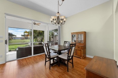 Luxurious Lakefront Living in The Meadows of Palm City! Enjoy on Monarch Country Club in Florida - for sale on GolfHomes.com, golf home, golf lot