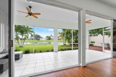 Luxurious Lakefront Living in The Meadows of Palm City! Enjoy on Monarch Country Club in Florida - for sale on GolfHomes.com, golf home, golf lot