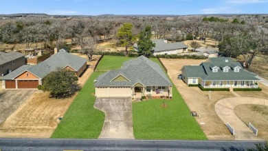 This thoughtfully designed 3-bedroom, 2-bath home offers on Lake Kiowa Golf Course in Texas - for sale on GolfHomes.com, golf home, golf lot