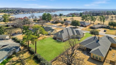 This thoughtfully designed 3-bedroom, 2-bath home offers on Lake Kiowa Golf Course in Texas - for sale on GolfHomes.com, golf home, golf lot