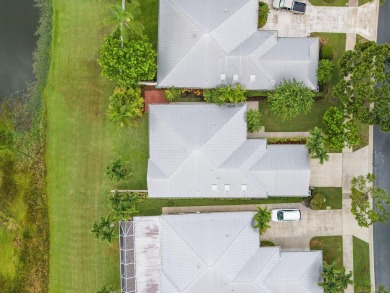 Luxurious Lakefront Living in The Meadows of Palm City! Enjoy on Monarch Country Club in Florida - for sale on GolfHomes.com, golf home, golf lot