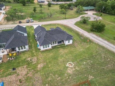 Here is your chance to own a like new home in the peaceful lake on The Club At Runaway Bay in Texas - for sale on GolfHomes.com, golf home, golf lot