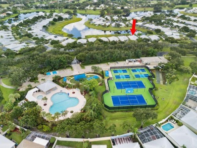 Luxurious Lakefront Living in The Meadows of Palm City! Enjoy on Monarch Country Club in Florida - for sale on GolfHomes.com, golf home, golf lot