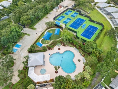 Luxurious Lakefront Living in The Meadows of Palm City! Enjoy on Monarch Country Club in Florida - for sale on GolfHomes.com, golf home, golf lot