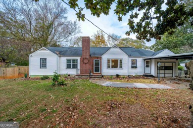 Discover the allure of this charming ranch-style home in Tucker on Heritage Golf Links in Georgia - for sale on GolfHomes.com, golf home, golf lot