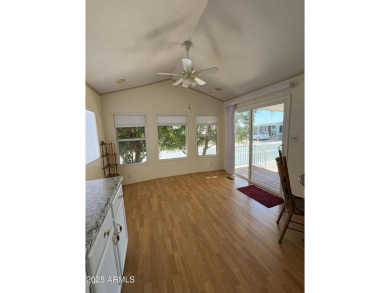 Beautifully updated 1994 park model in Carriage Manor, a premier on Fountain of the Sun Country Club in Arizona - for sale on GolfHomes.com, golf home, golf lot