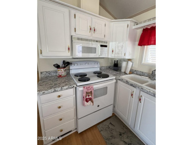 Beautifully updated 1994 park model in Carriage Manor, a premier on Fountain of the Sun Country Club in Arizona - for sale on GolfHomes.com, golf home, golf lot
