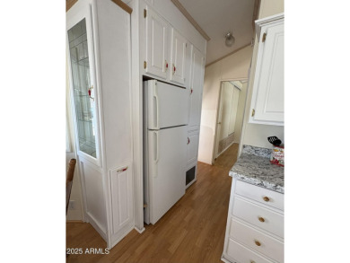 Beautifully updated 1994 park model in Carriage Manor, a premier on Fountain of the Sun Country Club in Arizona - for sale on GolfHomes.com, golf home, golf lot