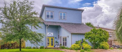 Welcome to this stunning home in the Santa Rosa Shores Canal on Tiger Point Golf and Country Club in Florida - for sale on GolfHomes.com, golf home, golf lot