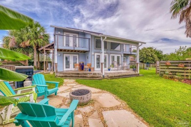 Welcome to this stunning home in the Santa Rosa Shores Canal on Tiger Point Golf and Country Club in Florida - for sale on GolfHomes.com, golf home, golf lot