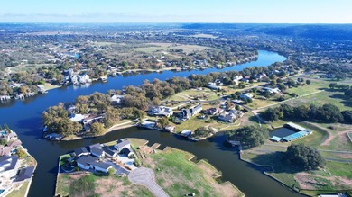 Rare opportunity to own a waterfront, half-acre lot in on Legends Golf Course in Texas - for sale on GolfHomes.com, golf home, golf lot