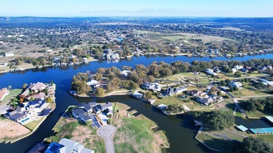 Rare opportunity to own a waterfront, half-acre lot in on Legends Golf Course in Texas - for sale on GolfHomes.com, golf home, golf lot