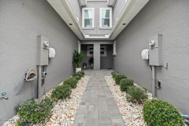 Get ready to fall in love with this exceptional townhouse in the on Venetian Bay Golf Course in Florida - for sale on GolfHomes.com, golf home, golf lot