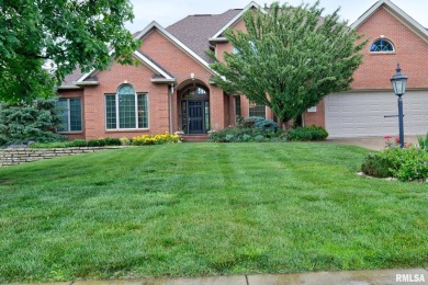 This custom built all brick home situated on the signature fifth on WeaverRidge Golf Club in Illinois - for sale on GolfHomes.com, golf home, golf lot