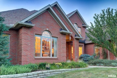 This custom built all brick home situated on the signature fifth on WeaverRidge Golf Club in Illinois - for sale on GolfHomes.com, golf home, golf lot