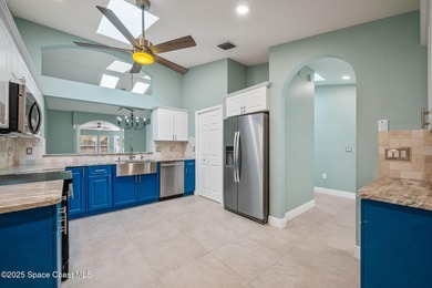 FORE! Just park your golf cart in your garage. Home handy to on Suntree Country Club in Florida - for sale on GolfHomes.com, golf home, golf lot