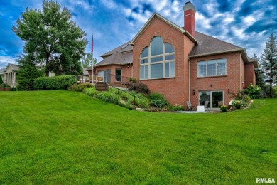 This custom built all brick home situated on the signature fifth on WeaverRidge Golf Club in Illinois - for sale on GolfHomes.com, golf home, golf lot