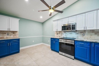 FORE! Just park your golf cart in your garage. Home handy to on Suntree Country Club in Florida - for sale on GolfHomes.com, golf home, golf lot