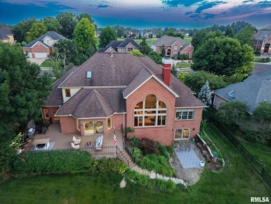 This custom built all brick home situated on the signature fifth on WeaverRidge Golf Club in Illinois - for sale on GolfHomes.com, golf home, golf lot