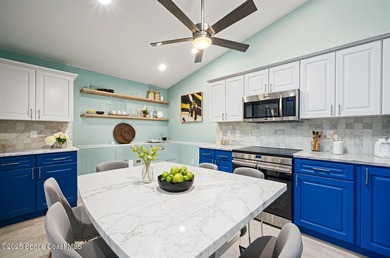 FORE! Just park your golf cart in your garage. Home handy to on Suntree Country Club in Florida - for sale on GolfHomes.com, golf home, golf lot